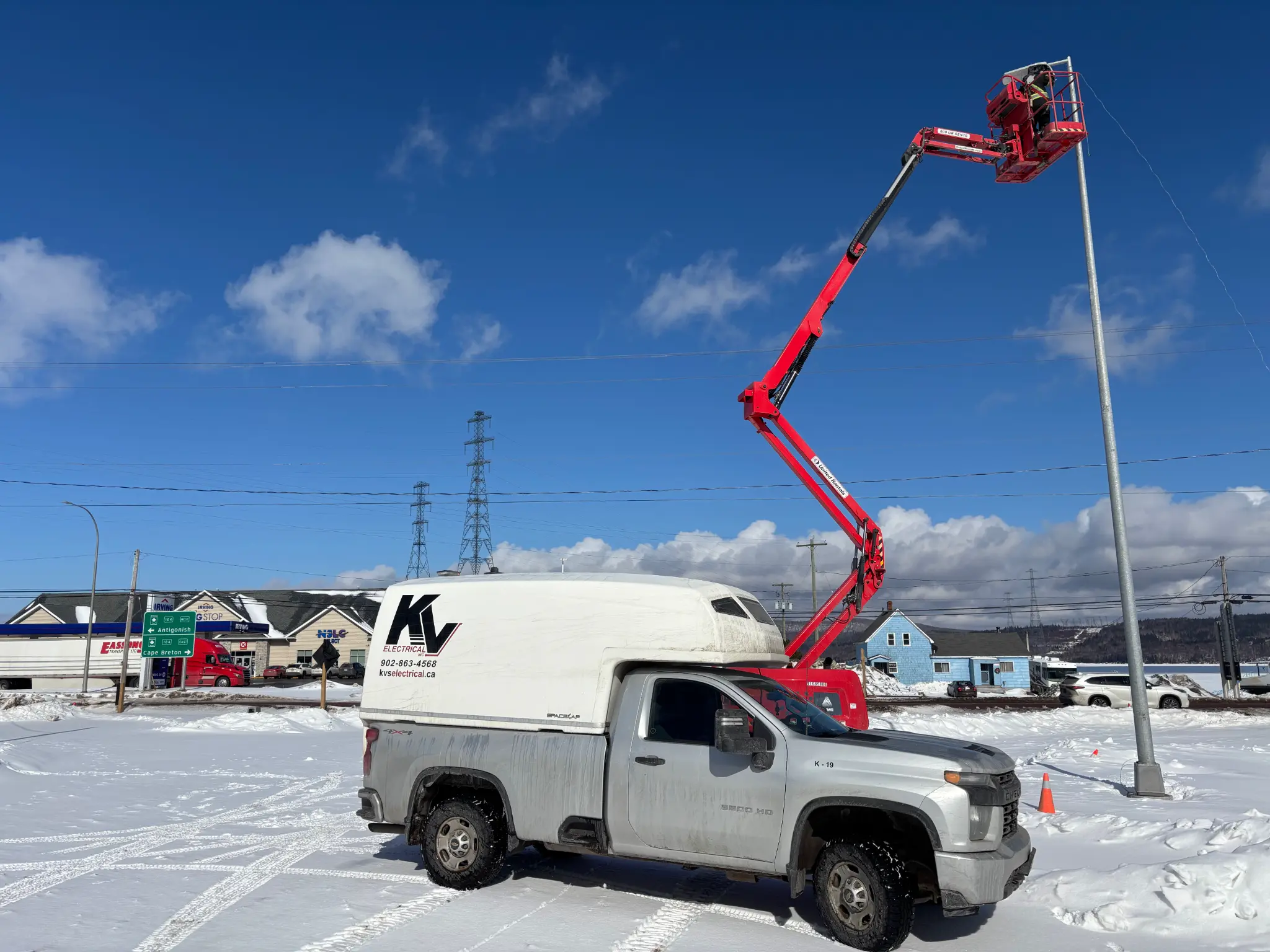 KVS Electrical commercial service truck and boom lift on site
